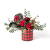 Tickled Floral sells this Valentine's Day arrangement call Flirty Feathers. It has red roses and black feathers.